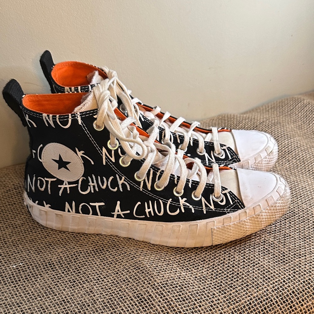 Converse Black and White High-Top  Sneakers with Orange Lining